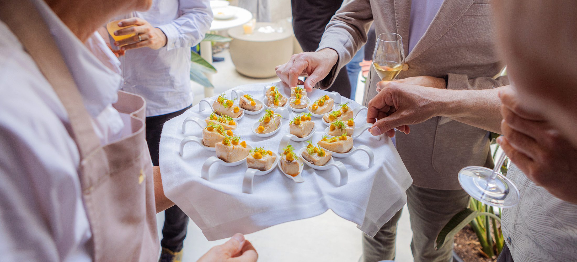 Guests enjoying gourmet canapés served by Esteve Catering during a private birthday celebration in Granollers.