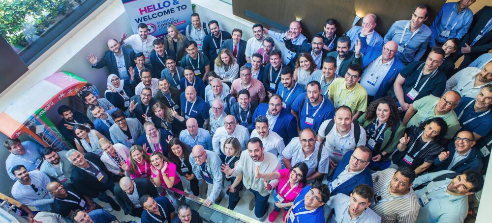 Attendees gathered for a group photo during the Mobius Connect Congress in Barcelona.