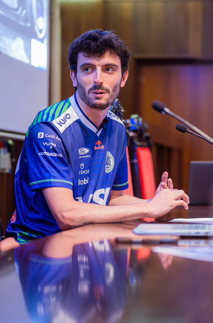 Visa Cash App Racing Bulls engineer Guillaume Ducreux speaking during the VCARB Formula 1 career event at UPC Barcelona, photographed by Barcelona event photographer Magdalena Bee.
