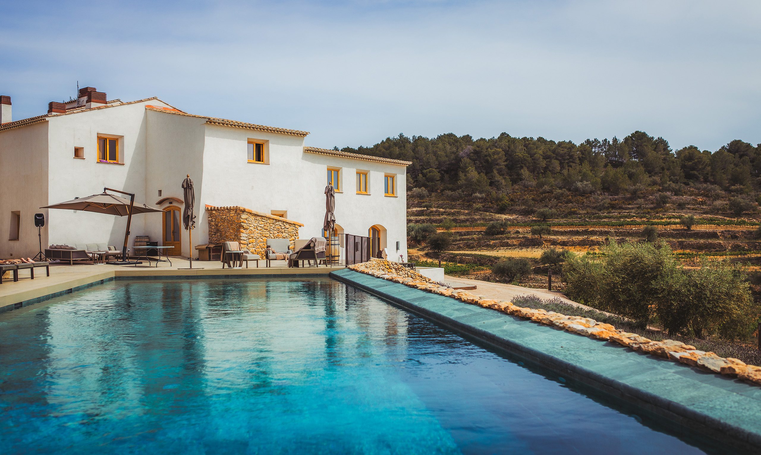 Masia Cabellut Vineyard Estate in Tarragona Masia Cabellut vineyard estate in Tarragona with a white country house, swimming pool, lavender garden and surrounding vineyards.